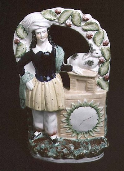 Staffordshire figure of a man with a rabbit, 1840 by English School
